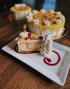 Lemon Raspberry Swirl Cheesecake |  slice